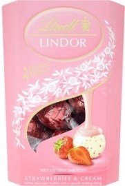 Lindt & Sprüngli Lindor Biela čokoláda s kúskami jahôd a so smotanou s jemnou krémovou náplňou 200g