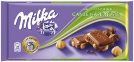 Milka Mliečna čokoláda z alpského mlieka s celými lieskovými orechami 100g